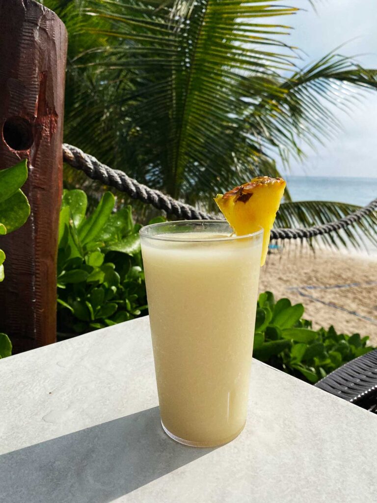 Pina Colada on the beach at an all-inclusive resort