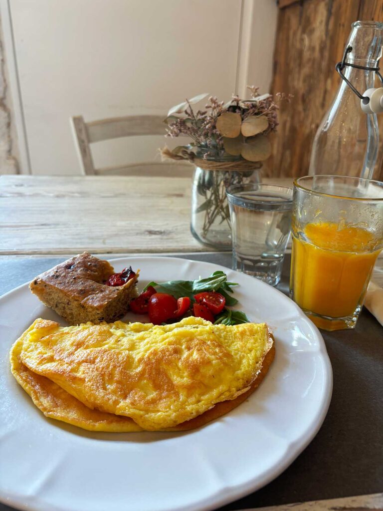 Vegetarian Omelet with Tomatoes and Cheese for Breakfast in Alberobello at Cosi Comera