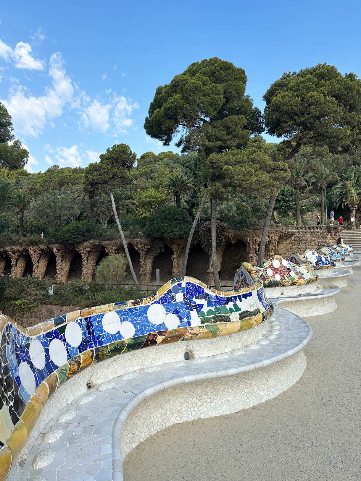Mosaic Benches in Nature Square in Parc Guell, Barcelona, Spain