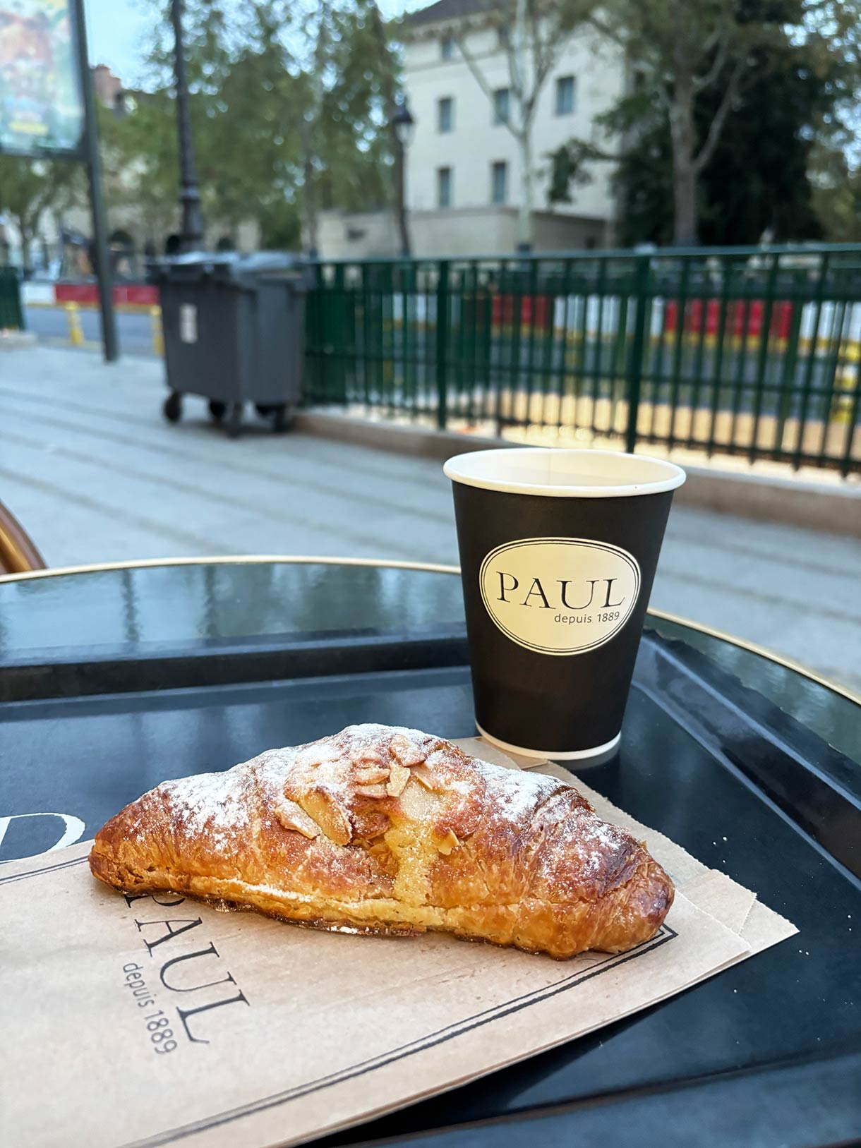 Croissant and Coffee for Breakfast at Paul Bakery in Paris France