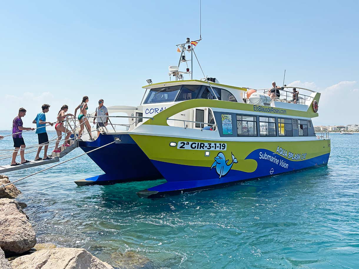 Boarding a Boat Excursion at the Pier in Roses, Spain