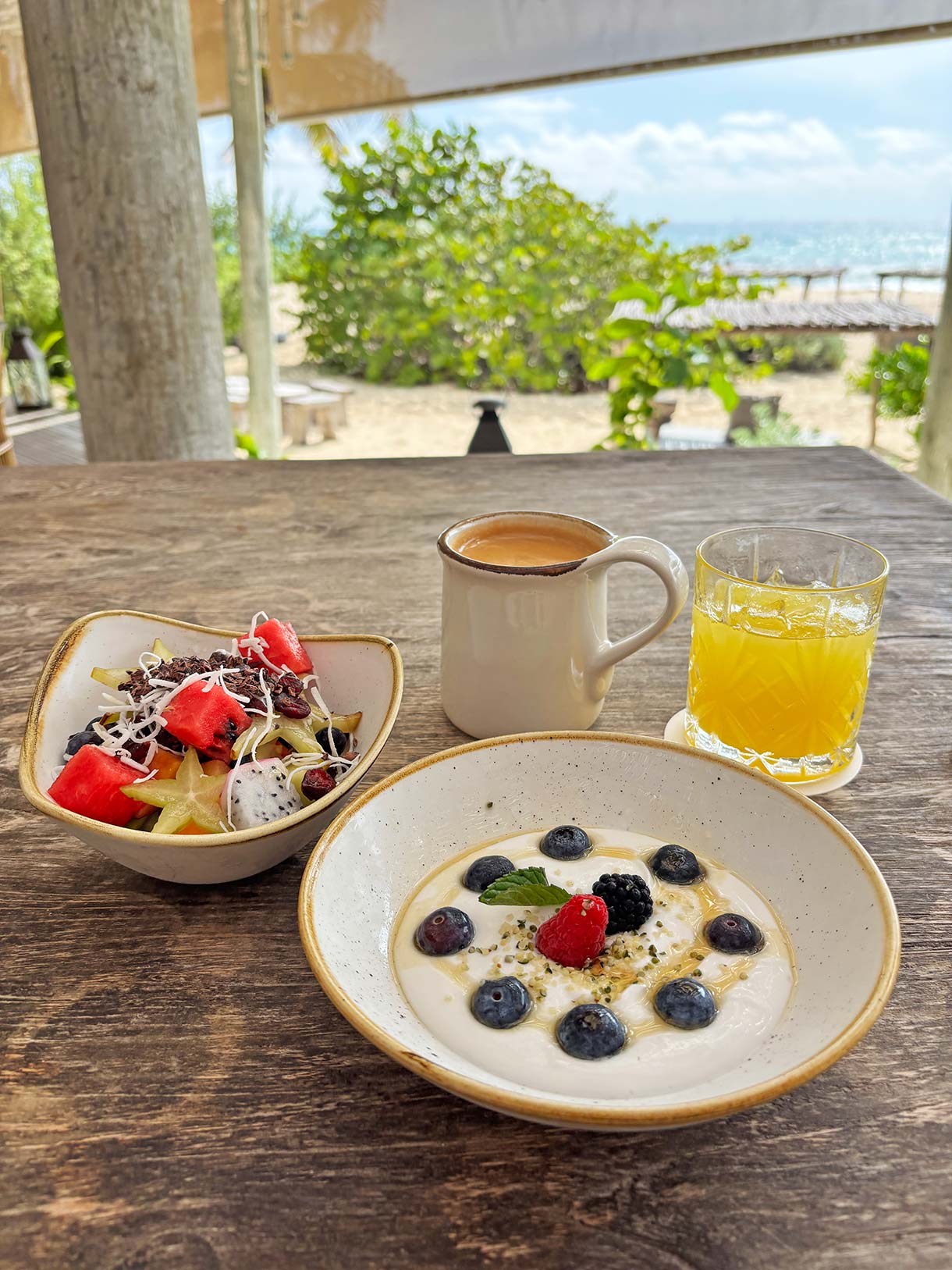 Vegan Fruit and Coconut Yogurt with Coffee and Pineapple Juice at Su Casa Restaurant at Palmaia the House of Aia Resort in Mexico
